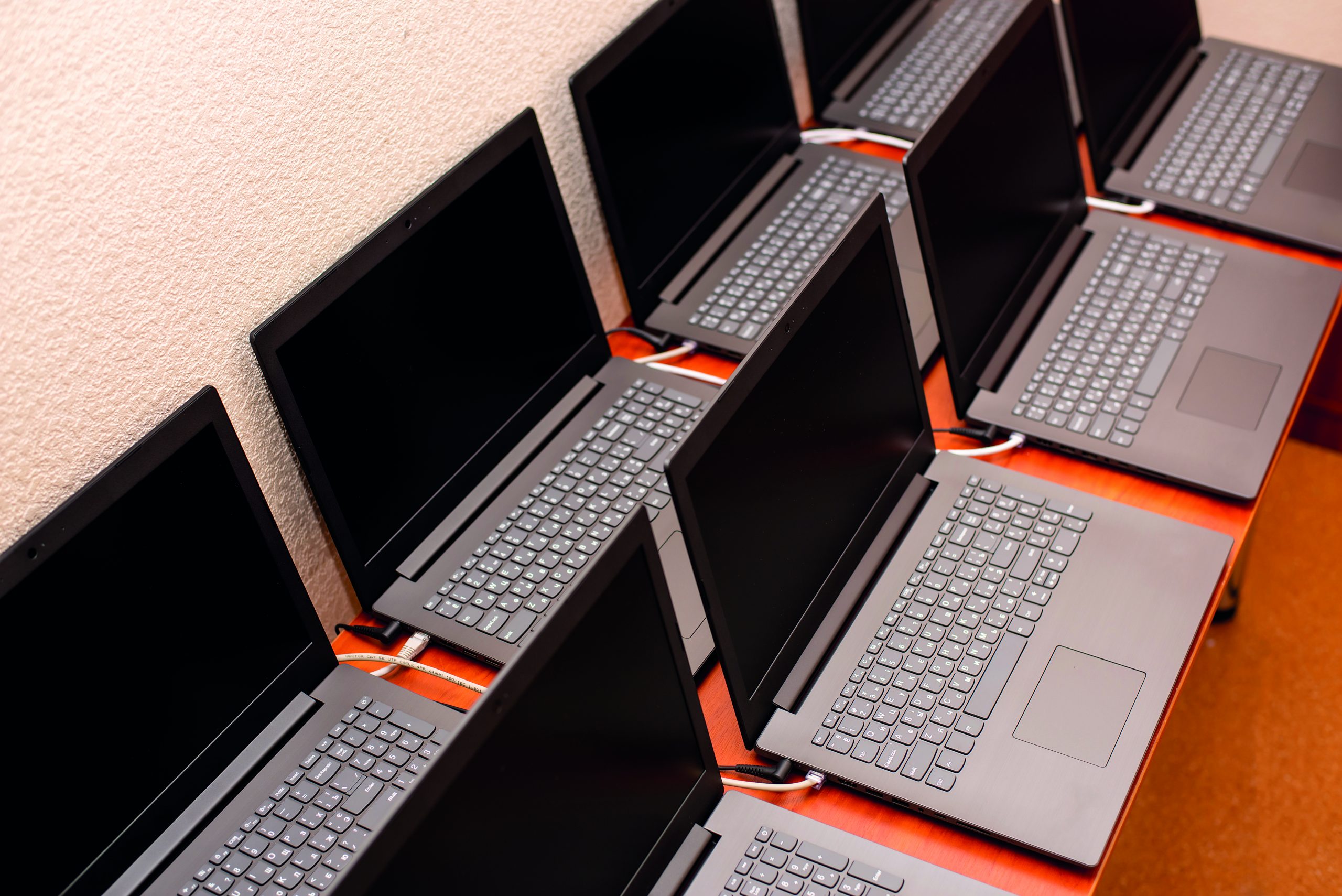 many laptops are on the table